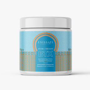 Un pot blanc orné d'une étiquette à motifs bleus et dorés ENISSATI COSMETICS HYDRA THERAPY BTX, mettant en valeur l'aloe vera, la glycérine et la kératine, idéal pour une hydratation intense. Découvrez les avis d'Enissati, parfait pour un lissage brésilien longue durée.