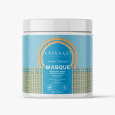 Un pot blanc de masque Hydra Therapy d'Enissat Cosmetics avec une étiquette géométrique bleue et dorée, présentant les détails du produit et des ingrédients comme l'aloe vera et la glycérine, idéal pour ceux qui recherchent des Enissati avis sur la durée du lissage brésilien ou le lissage brésilien. 
